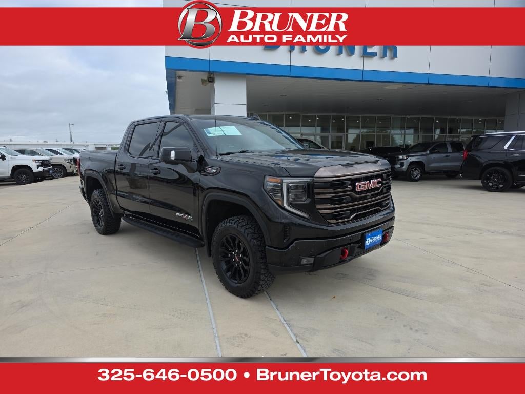 2022 GMC Sierra AT4X in Onyx Black — front three-quarter view