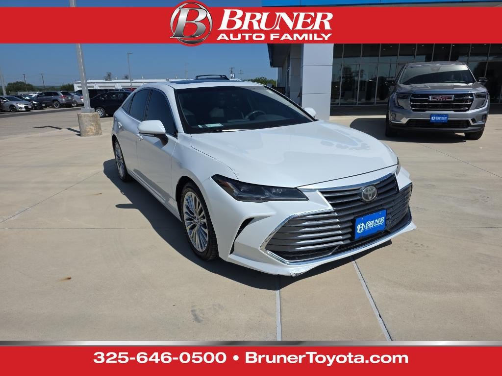 2019 Toyota Avalon Limited in Wind Chill Pearl — front three-quarter view