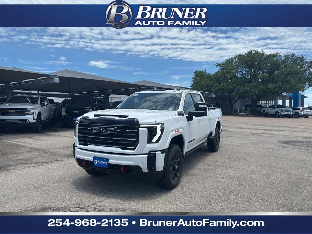 2026 GMC Sierra 2500 HD AT4 in Summit White — front three-quarter view