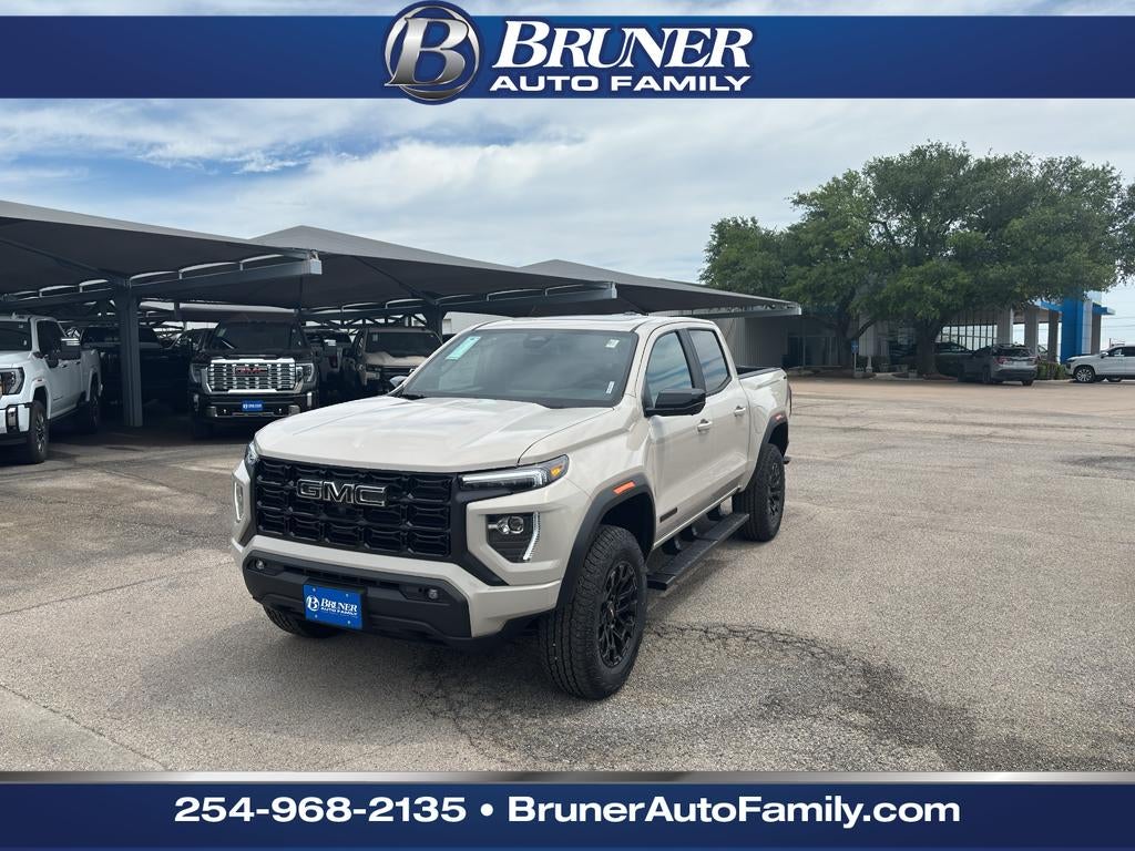 2026 GMC Canyon Elevation in Coastal Dune — front three-quarter view