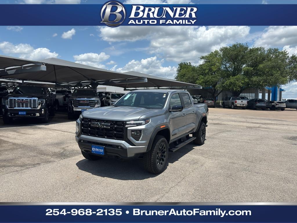 2026 GMC Canyon Elevation in Sterling Metallic — front three-quarter view