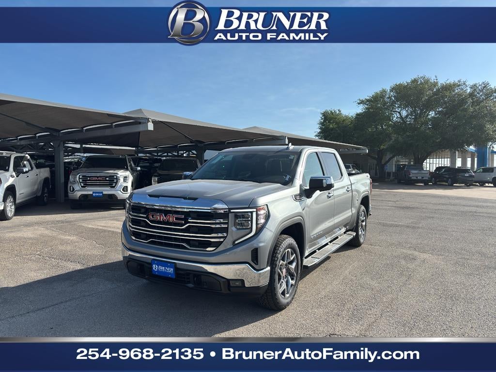 2026 GMC Sierra 1500 SLT in Sterling Metallic — front three-quarter view