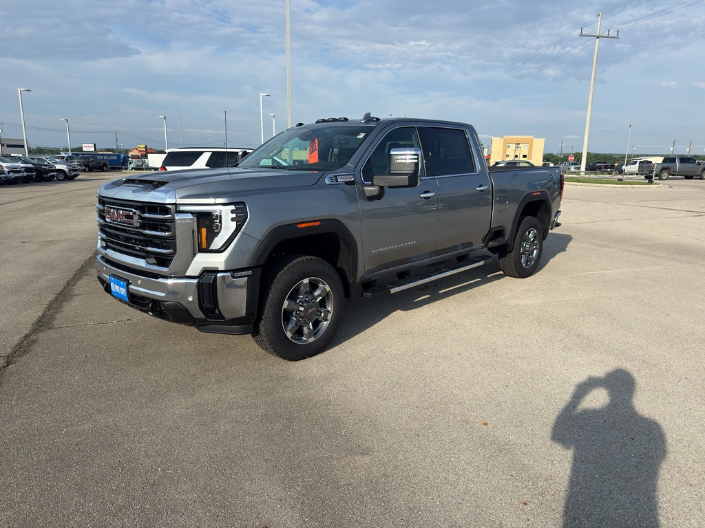 2026 GMC Sierra 2500 HD SLT in Sterling Metallic — front three-quarter view