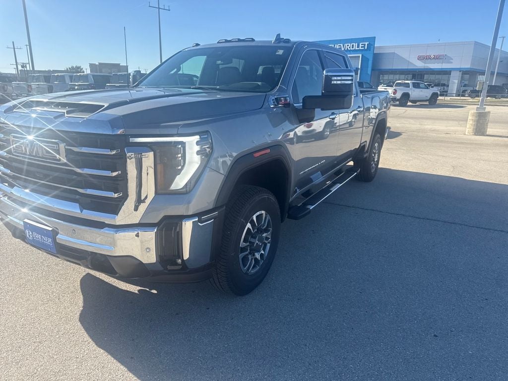 2026 GMC Sierra 2500 HD SLT in Sterling Metallic — front three-quarter view