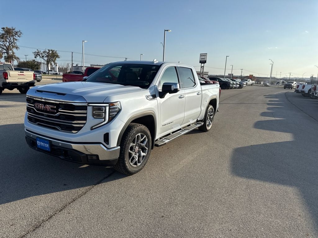 2026 GMC Sierra 1500 SLT in Glacier White Tricoat — front three-quarter view