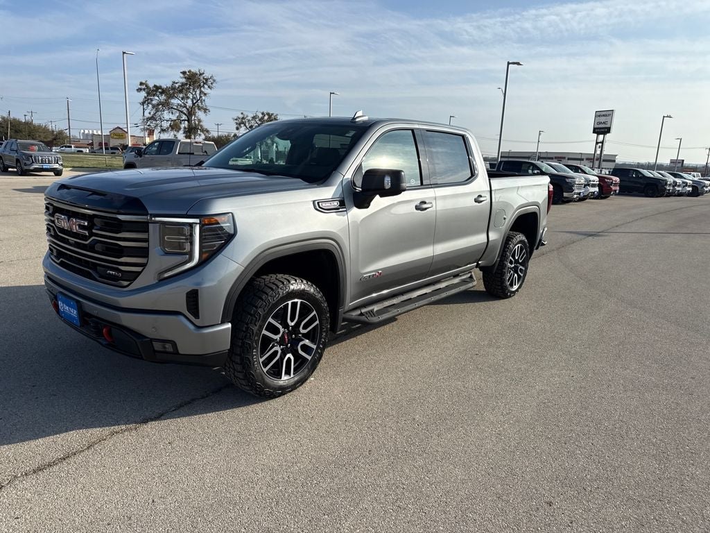2026 GMC Sierra 1500 AT4 in Sterling Metallic — front three-quarter view