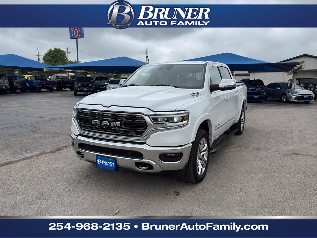 2024 RAM 1500 Limited Crew Cab 4x4 5'7' Box in Ivory White Tri-Coat Pearlcoat — front three-quarter view