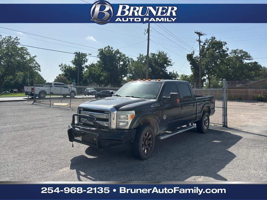2014 Ford F-350 Lariat in Tuxedo Black Metallic — front three-quarter view