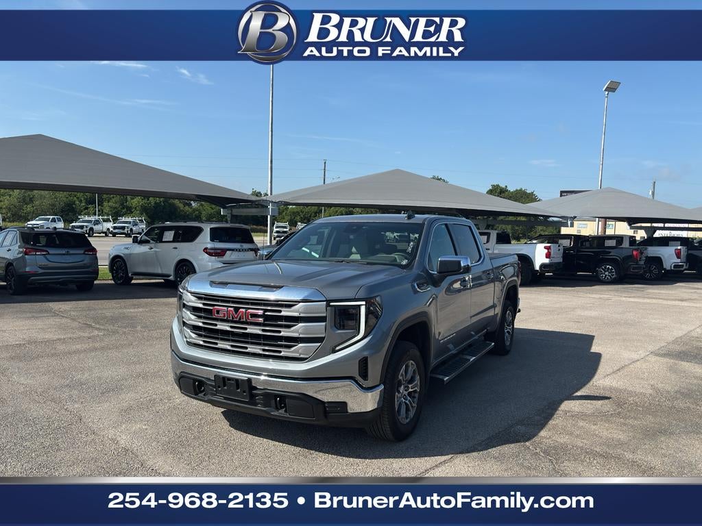 2024 GMC Sierra 1500 4WD Crew Cab Short Box SLE in Sterling Metallic — front three-quarter view