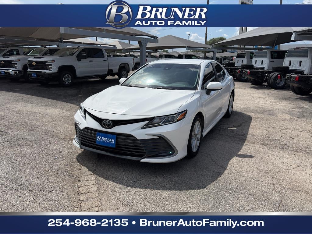 2023 Toyota Camry LE in Ice Cap — front three-quarter view